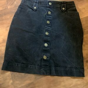 Black denim skirt with front button closure